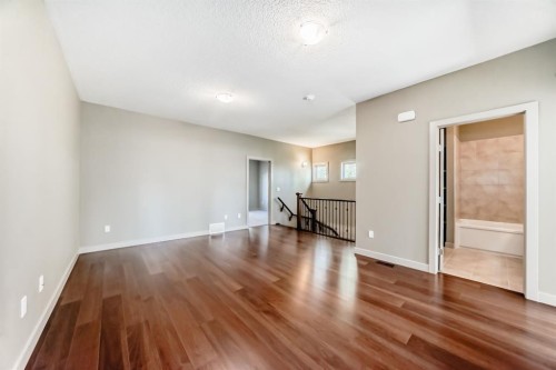 12 Cougar Ridge Landing Sw, Calgary, AB - Indoor Photo Showing Other Room