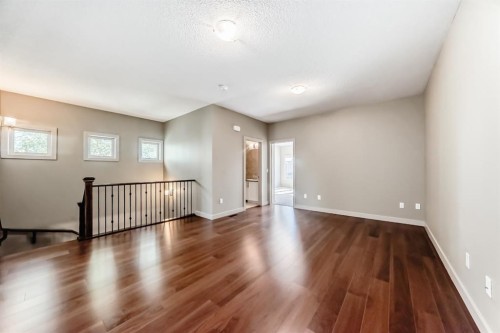 12 Cougar Ridge Landing Sw, Calgary, AB - Indoor Photo Showing Other Room