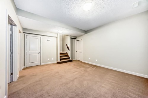12 Cougar Ridge Landing Sw, Calgary, AB - Indoor Photo Showing Other Room