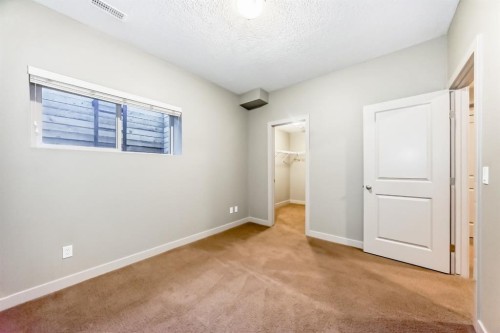 12 Cougar Ridge Landing Sw, Calgary, AB - Indoor Photo Showing Other Room