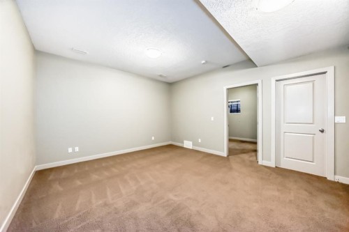 12 Cougar Ridge Landing Sw, Calgary, AB - Indoor Photo Showing Other Room