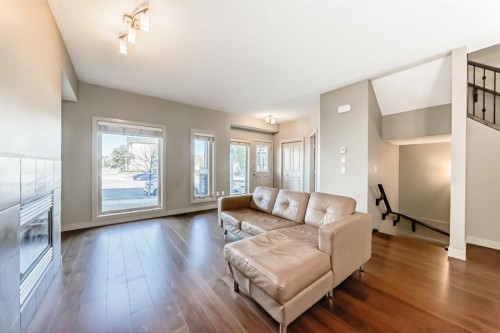 12 Cougar Ridge Landing Sw, Calgary, AB - Indoor Photo Showing Living Room