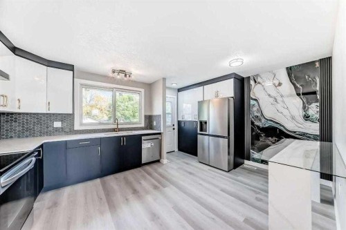 15104 1 Street Se, Calgary, AB - Indoor Photo Showing Kitchen With Stainless Steel Kitchen