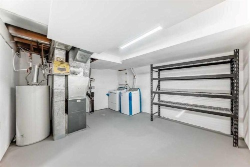 15104 1 Street Se, Calgary, AB - Indoor Photo Showing Basement