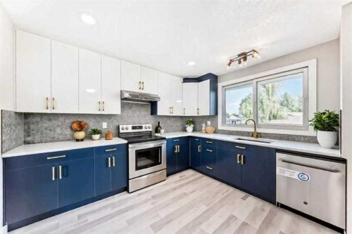 15104 1 Street Se, Calgary, AB - Indoor Photo Showing Kitchen With Stainless Steel Kitchen