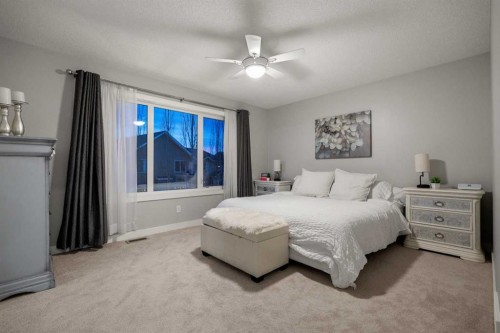 2322 Bayside Circle Sw, Airdrie, AB - Indoor Photo Showing Bedroom