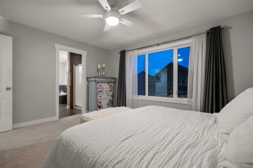 2322 Bayside Circle Sw, Airdrie, AB - Indoor Photo Showing Bedroom
