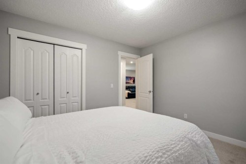 2322 Bayside Circle Sw, Airdrie, AB - Indoor Photo Showing Bedroom