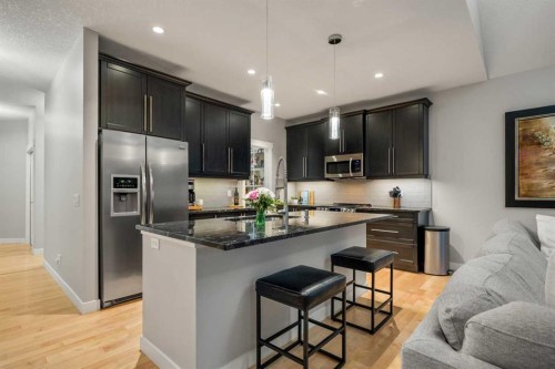 2322 Bayside Circle Sw, Airdrie, AB - Indoor Photo Showing Kitchen With Stainless Steel Kitchen With Upgraded Kitchen