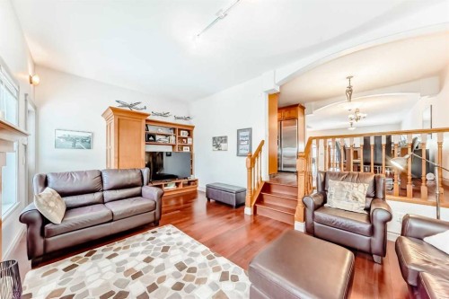 252 18 Avenue Nw, Calgary, AB - Indoor Photo Showing Living Room With Fireplace