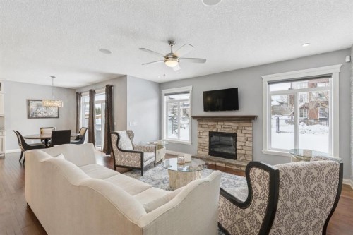 135 Auburn Sound Manor Se, Calgary, AB - Indoor Photo Showing Living Room With Fireplace