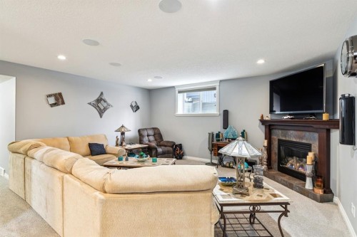 135 Auburn Sound Manor Se, Calgary, AB - Indoor Photo Showing Other Room With Fireplace