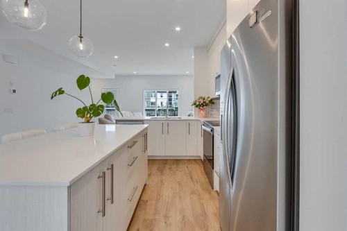 302-6 Merganser Drive, Chestermere, AB - Indoor Photo Showing Kitchen With Upgraded Kitchen