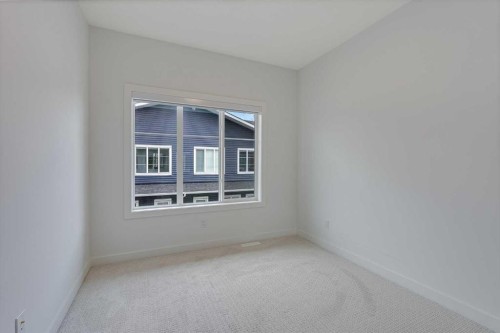 302-6 Merganser Drive, Chestermere, AB - Indoor Photo Showing Other Room