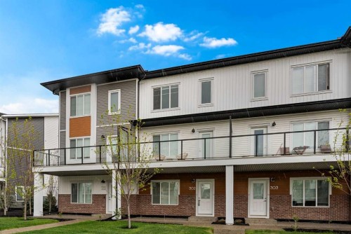 302-6 Merganser Drive, Chestermere, AB - Outdoor With Balcony