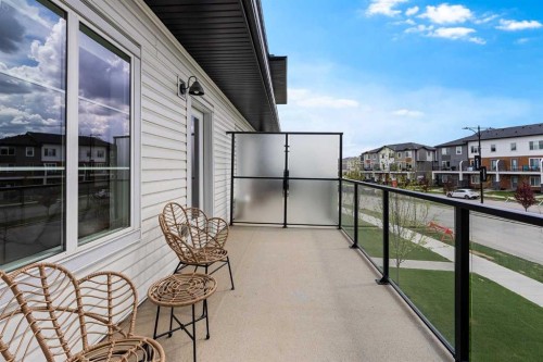 302-6 Merganser Drive, Chestermere, AB - Outdoor With Balcony With Exterior