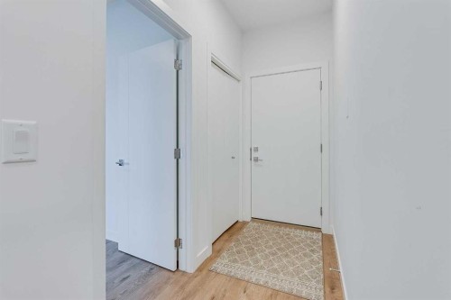 302-6 Merganser Drive, Chestermere, AB - Indoor Photo Showing Other Room