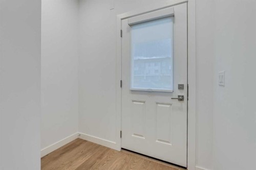 302-6 Merganser Drive, Chestermere, AB - Indoor Photo Showing Other Room