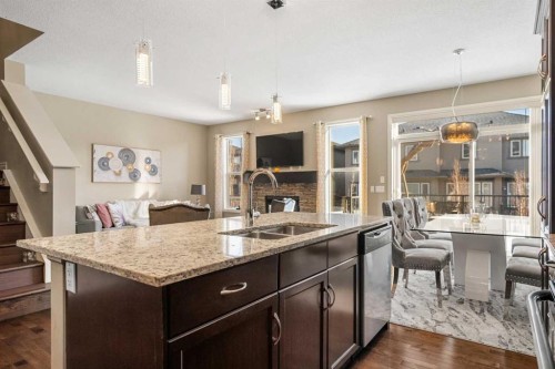 48 Evanswood Circle Nw, Calgary, AB - Indoor Photo Showing Kitchen With Double Sink