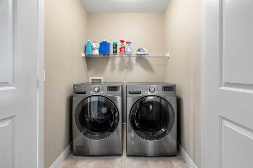 48 Evanswood Circle Nw, Calgary, AB - Indoor Photo Showing Laundry Room