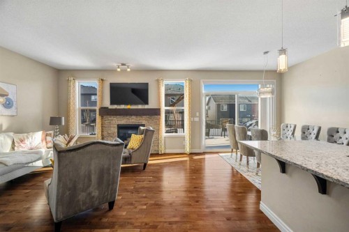48 Evanswood Circle Nw, Calgary, AB - Indoor Photo Showing Living Room With Fireplace