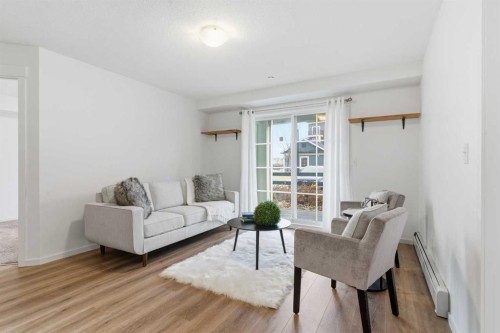 4114-99 Copperstone Park Se, Calgary, AB - Indoor Photo Showing Living Room