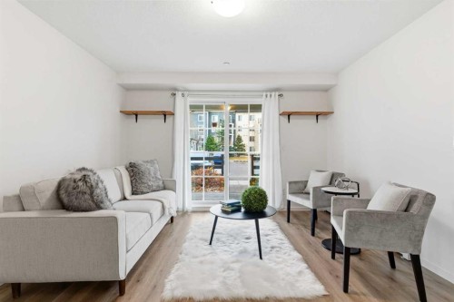 4114-99 Copperstone Park Se, Calgary, AB - Indoor Photo Showing Living Room