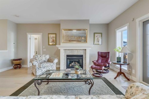 84 Shannon Estates Terrace Sw, Calgary, AB - Indoor Photo Showing Living Room With Fireplace