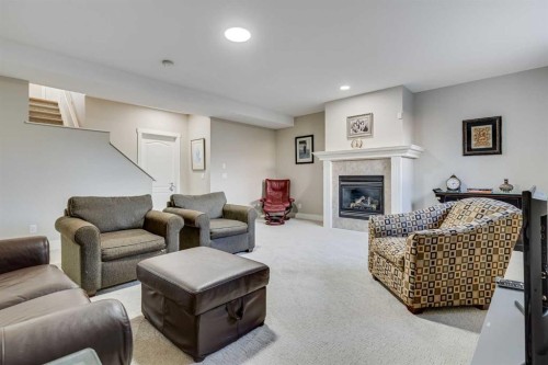 84 Shannon Estates Terrace Sw, Calgary, AB - Indoor Photo Showing Other Room With Fireplace