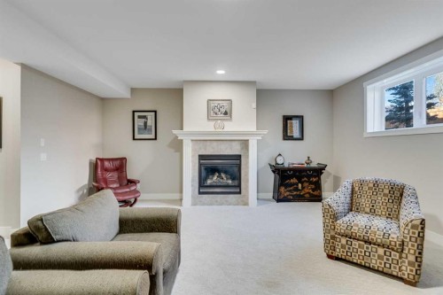 84 Shannon Estates Terrace Sw, Calgary, AB - Indoor Photo Showing Living Room With Fireplace