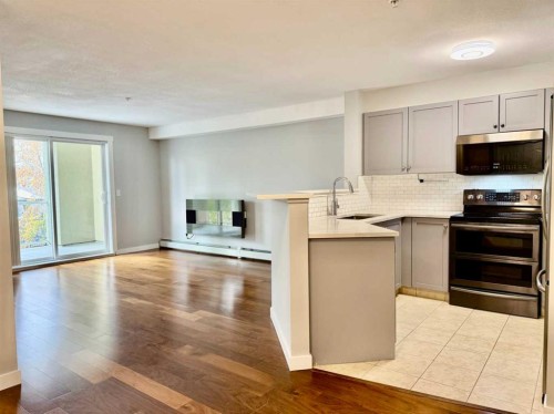 1212-2518 Fish Creek Boulevard Sw, Calgary, AB - Indoor Photo Showing Kitchen