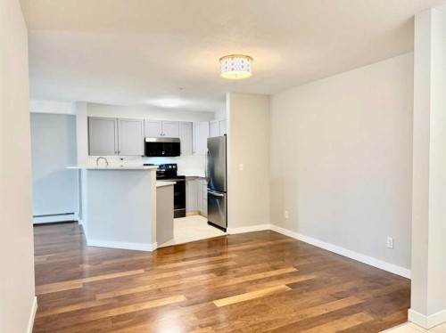 1212-2518 Fish Creek Boulevard Sw, Calgary, AB - Indoor Photo Showing Kitchen