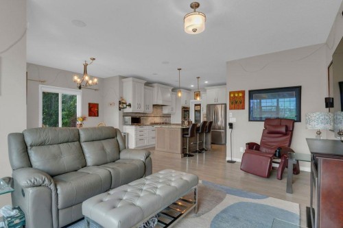 138 Reunion Landing, Airdrie, AB - Indoor Photo Showing Living Room