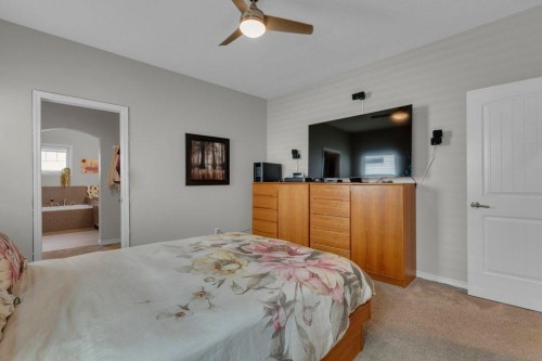 138 Reunion Landing, Airdrie, AB - Indoor Photo Showing Bedroom