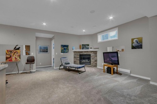138 Reunion Landing, Airdrie, AB - Indoor With Fireplace