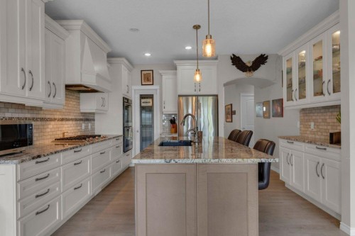 138 Reunion Landing, Airdrie, AB - Indoor Photo Showing Kitchen With Upgraded Kitchen