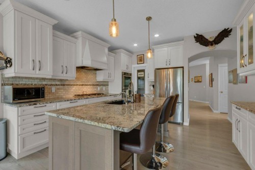 138 Reunion Landing, Airdrie, AB - Indoor Photo Showing Kitchen With Stainless Steel Kitchen With Upgraded Kitchen