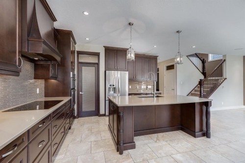 202 Cooperstown Lane Sw, Airdrie, AB - Indoor Photo Showing Kitchen With Stainless Steel Kitchen With Upgraded Kitchen