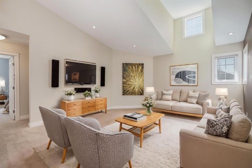 202 Cooperstown Lane Sw, Airdrie, AB - Indoor Photo Showing Living Room