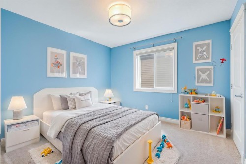 202 Cooperstown Lane Sw, Airdrie, AB - Indoor Photo Showing Bedroom