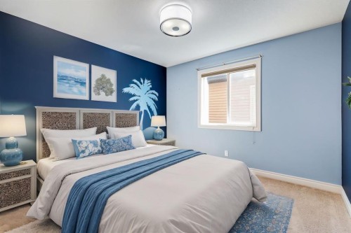 202 Cooperstown Lane Sw, Airdrie, AB - Indoor Photo Showing Bedroom