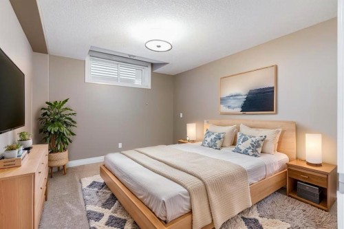 202 Cooperstown Lane Sw, Airdrie, AB - Indoor Photo Showing Bedroom