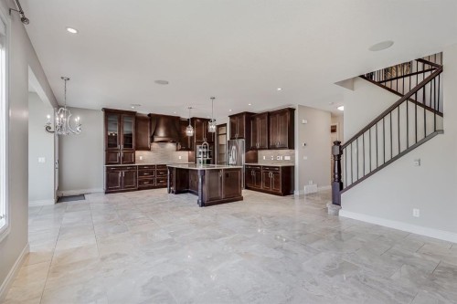 202 Cooperstown Lane Sw, Airdrie, AB - Indoor Photo Showing Kitchen With Upgraded Kitchen
