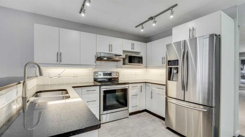 3667 Sierra Morena Road Sw, Calgary, AB - Indoor Photo Showing Kitchen With Stainless Steel Kitchen With Double Sink With Upgraded Kitchen