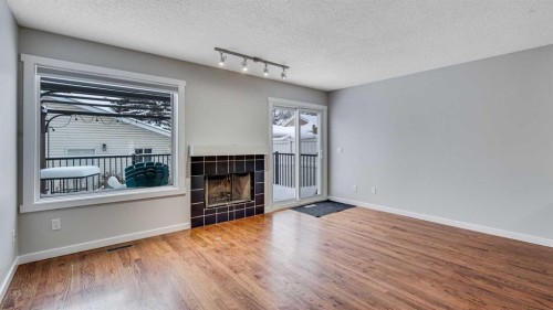3667 Sierra Morena Road Sw, Calgary, AB - Indoor With Fireplace