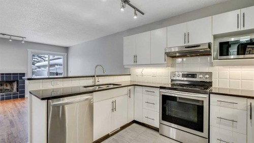 3667 Sierra Morena Road Sw, Calgary, AB - Indoor Photo Showing Kitchen With Stainless Steel Kitchen With Double Sink