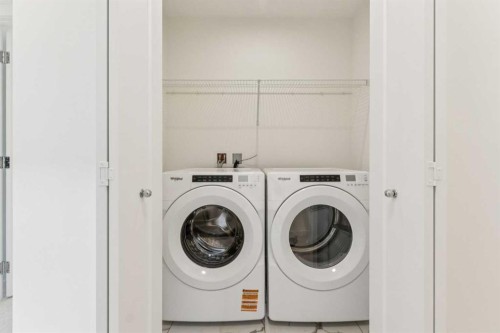 122-1862 Cornerstone Boulevard, Calgary, AB - Indoor Photo Showing Laundry Room