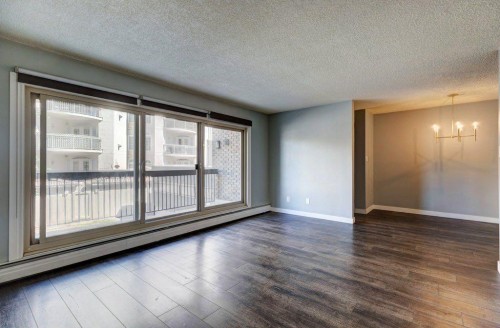 211-1335 12 Avenue Sw, Calgary, AB - Indoor Photo Showing Other Room