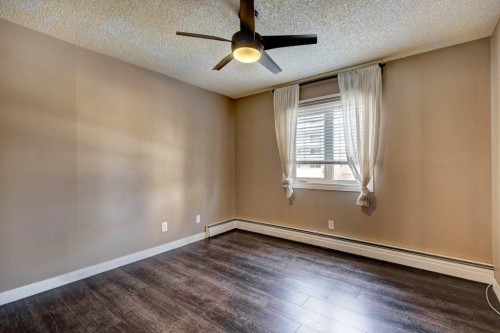 211-1335 12 Avenue Sw, Calgary, AB - Indoor Photo Showing Other Room