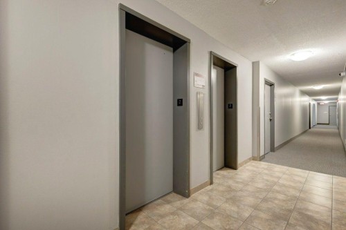 211-1335 12 Avenue Sw, Calgary, AB - Indoor Photo Showing Other Room